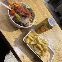 Salad bowl, fries, and drink  at Maoz - Damrak in Amsterdam