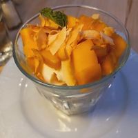 Coconut sorbet with mango & coconut shavings at Cocorico in Ashland