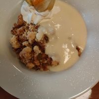 Rubarb and strawberry crumble with custard at Bricín Restaurant and Boxty House in Killarney