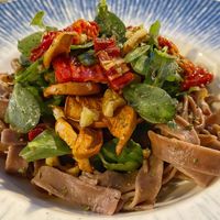 Gluten-free pasta with sun-dried tomatoes, purslane, walnuts and dried fruit.  at İncir Kayaköy - Maybe closed in Mugla