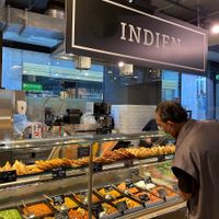 Indian prepared food station at MANOR in Lausanne