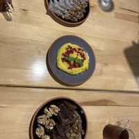 deserts; carrot desert, semolina halva with somesort of fruit (the cook actually won first prize at some contest with this, it‘s amaaaazing!!) and a grape desert, so good!  at Sisters' Plant Based in Goreme