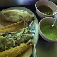 vegetarian tamales (sin Manteca) with spinach, mushroom and cheese. served with rather watery but tasty guacamole and salsa. at Trigo Verde in Oaxaca