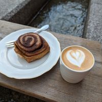 Cappuccino and cinnamon roll at Bächle in Freiburg