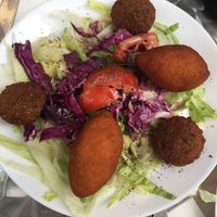 Kebbeh and falafel plate, served with salad and french fries at Le Levantin in Clermont-ferrand
