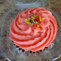 Birthday cupcake. Cake is yellow with sprinkles baked in. at Totally Sweet in Cleveland
