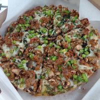 Signature Vegan Tremonster on traditional/round crust. Size small, but it was very filling with its thicker crust and generous cheese. at Primoz Pizzeria in Mentor