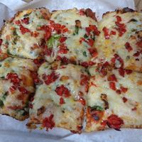 Supposed to be a deep dish vegan Lakewood minus onions, but they also left off the tomatoes and the roasted garlic and added black olives which was very upsetting and not at all what was asked for. at Primoz Pizzeria in Mentor