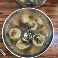 Rice cakes with dumplings Soup at Daom Noodle 다옴국수 in Seoul