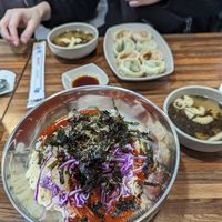 Bibim guksu and mandu in background at Daom Noodle 다옴국수 in Seoul
