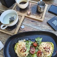 Toast with guacamole, salad and egg. at BYOKO in Malaga