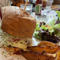 “I am Fabulous” burger, served with wedges and side salad    at Veggie4Love in Hong Kong Island