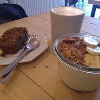 Soy yogurt with granola, carrot cake and speculatte at Taylor's Cafe in Brussels