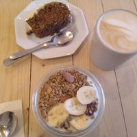 Soy yogurt with granola, carrot cake and speculatte at Taylor's Cafe in Brussels
