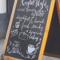Cute sign at Taylor's Cafe in Brussels