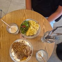 Sweet toast (granola) and savory toast (scrambled tofu). Highly reccomend both at Taylor's Cafe in Brussels