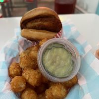 Spicy chick’n sandwich w/ tots ($20)  at Monty's Good Burger - Culver City in Culver City