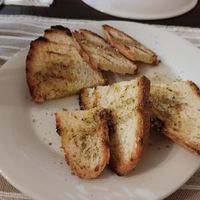 Appetizer for free : Toasted White Bread with Olive Oil and Herbs at Melitzia Taverna in Tala
