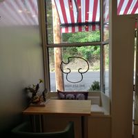 Front window seating nook at Secret Vegan Cafe in Kingston