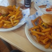 These are some of the best burgers I've had, period. The fries were great, too! at Secret Vegan Cafe in Kingston