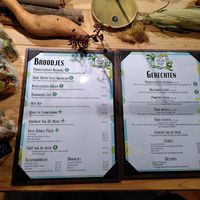 The menu, round dark green icon is vegan but many dishes can be veganised at Studio Sugar Snap in Utrecht