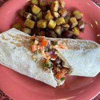 Breakfast burrito and home fries   at The Friendly Toast in Danvers
