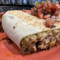 Tofu Burrito with home fries and fresh salsa 🤤😍  at The Friendly Toast in Danvers