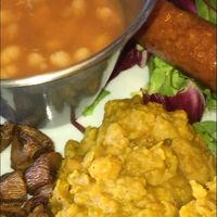 Bfast; chickpea scramble, baked beans, vegan sausage, mushrooms, salad and toast  at Balzunetta Restaurant in Floriana
