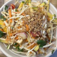 Mango, papaya and tofu salad   at Bandoola Bowl in Washington