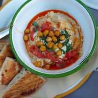 Hummus platter (LOTS of hummus) with a warm pita at EATERY in Athens