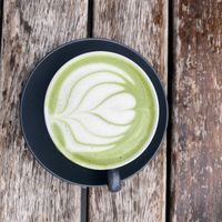 Matcha latte with oat milk; beautiful latte art    at The Milkman in Edinburgh