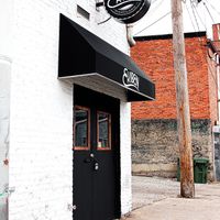 Store front in the alley. at Ekiben - W 36th St in Baltimore