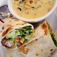 "save chick'n" wrap - buffalo fried chicken, lettuce, tomatoes, avocado, & creamy dressing w/ potato & kale soup at Loving Hut in Reynoldsburg