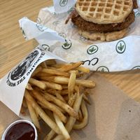 Fries and chicken and waffles sandwich   at Plant Power Fast Food - Craig Rd in Las Vegas