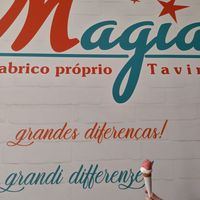 Watermelon and lemon sorbet in a cone at Gelato Magia in Tavira