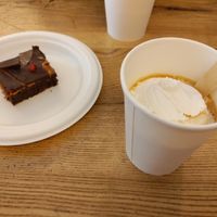 Peanut butter brownie and coffee with cream at La Colazione di Sara in Turin
