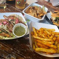 From left to right: banana blossom tacos, nachos, spicy fries and seitan quesadillas   at Antojitos - The Dog House in Edinburgh