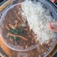 Detox lentils with rice comes with a nan and A crispy bread with pickled onions￼  at It's a Punjabi Affair in Amarillo