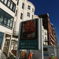 Sign on Brighton seafront at The No Catch Co in Brighton
