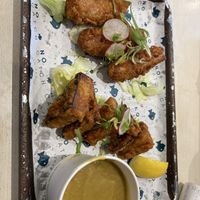 Three battered sausages and tofish bites (with more curry sauce)   at The No Catch Co in Brighton
