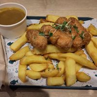 Large sausages and chips with curry sauce at The No Catch Co in Brighton