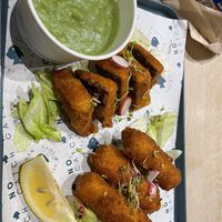 Tofish pieces, battered sausage and mushy peas   at The No Catch Co in Brighton