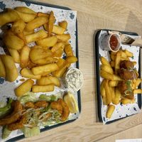 Prawns with chips and tartare sauce, and sausages with chips and ketchup  at The No Catch Co in Brighton