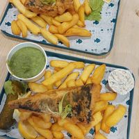 Large vegan cod and chips, bottom pictured with mushy peas, tartare sauce and gherkin at The No Catch Co in Brighton