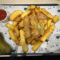 battered sausages, chips and gherkin  at The No Catch Co in Brighton