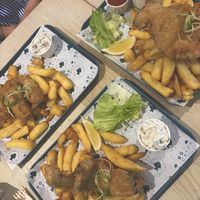 Cod and chips, haddock and chips and battered sausage and chips, with mushy peas and homemade tartare sauce.   at The No Catch Co in Brighton