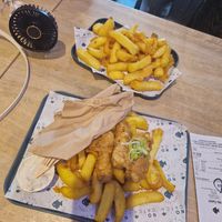 Battered sausages and chips with garlic aioli dip at The No Catch Co in Brighton