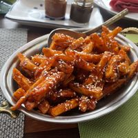 Masala Fries - sooo good almost tastes like sweet and sour  at Hola India in Jaco