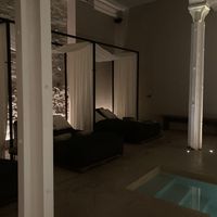 Beds by the pool  at Signature Spa - Organic & Vegan in Barcelona