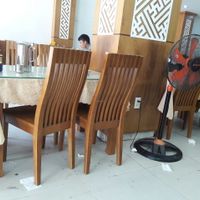 Floor littered with trash from previous guests at Thuy in Da Nang